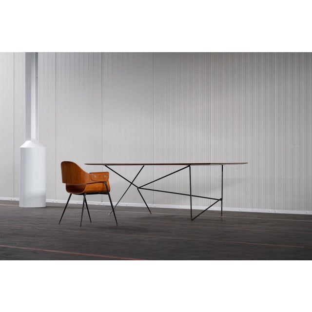 This fantastic desk table was personally made by Daniele Calabi for his own use in 1950. It's a unique piece with a...