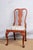 A Queen Anne style side chair, 20th century. A high quality reproduction custom made in the USA. Hand painted in red...