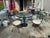 Vintage Woodward wrought iron patio set. Glass top table with 4 chairs. Suitable for covered patio with heavy duty vinyl...