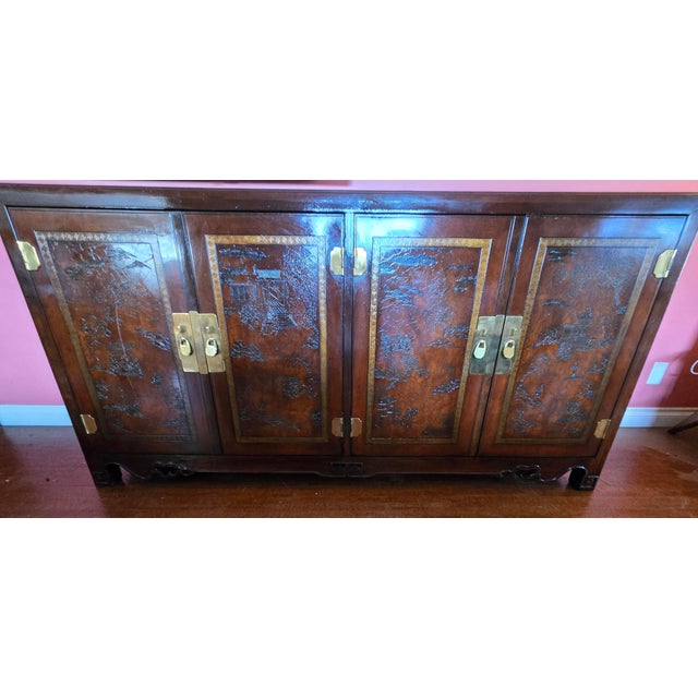 This is a beautiful vintage credenza from Drexel Heritage Furniture Company. It has scenes of traditional Asian buildings...