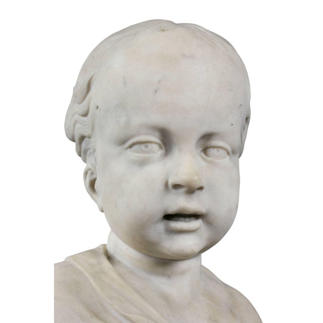 Nicely sculpted with most likely a later brown and white marble socle.