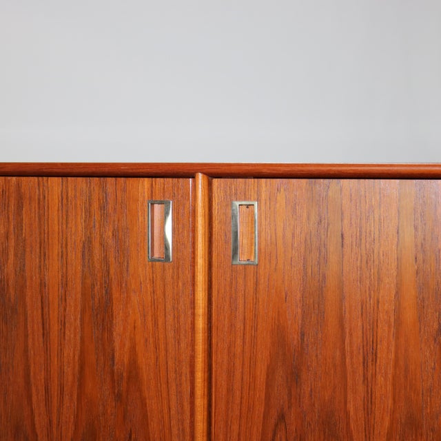 Mid Modern Danish Modern Teakwood over Pressed Board Double Door Armoire with Shelves & Drawers 20thC Measures - 53 3/8"H...