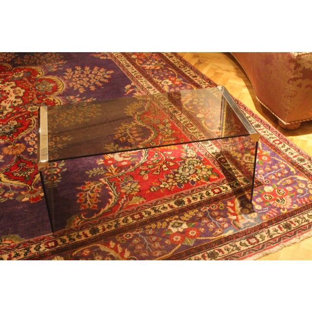 USA, 1970s A Waterfall style Pace International high quality grey smoked glass table with metal chrome steel connectors....