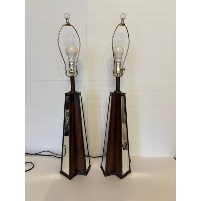 These Mid-Century Modern/Hollywood Regency pyramid mirrored glass panelled table lamps are just a stunning pair for the...