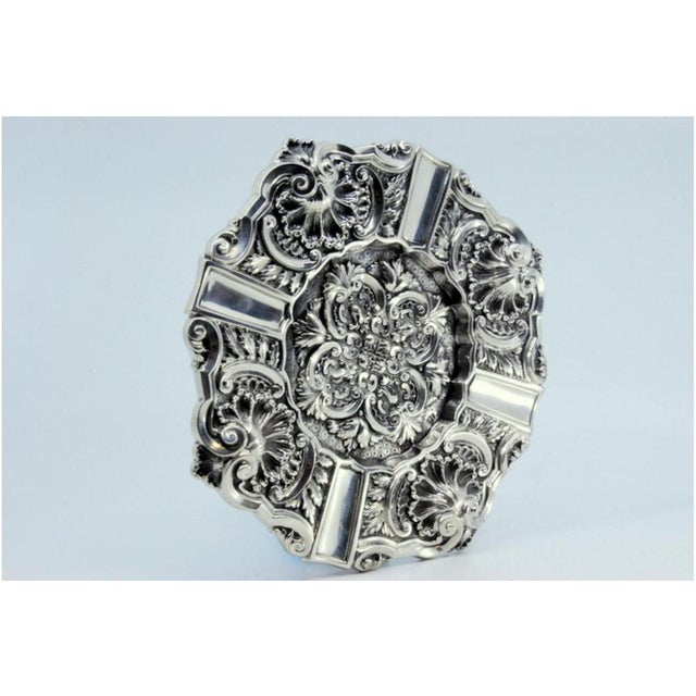 Silver Ashtray with Shell-Shaped Reliefs and Applications, in Very Good conditions. Designed 1920 to 1949 This piece has...