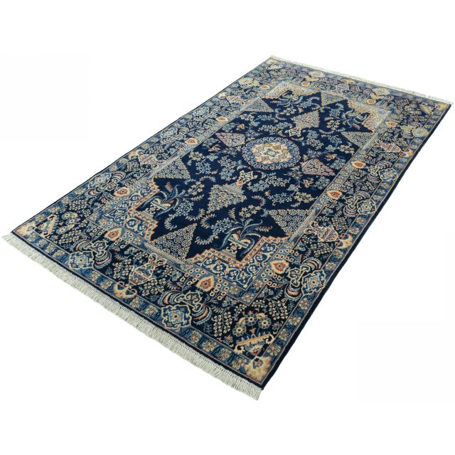 This elegant, hand-knotted Kashan Oriental rug, crafted from high-quality cork wool, is distinguished by its exquisite...
