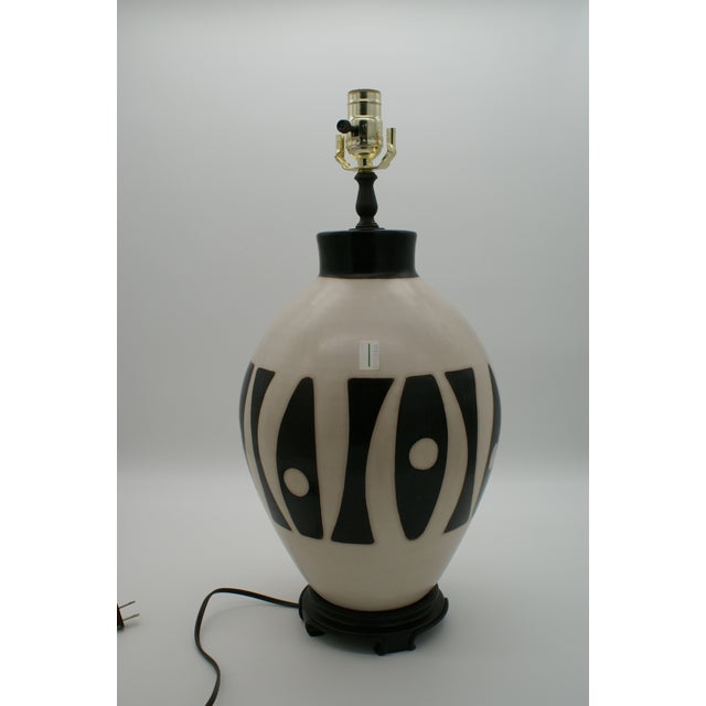 Black & Ivory Geometric Chulucanas Pottery Lamp – Handcrafted Peruvian Art Add a touch of artisan elegance to your home...