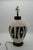 Black & Ivory Geometric Chulucanas Pottery Lamp – Handcrafted Peruvian Art Add a touch of artisan elegance to your home...