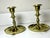 Pair of vintage brass chamberstick candlestick holders. The design is reminiscent of classic 18th century designs...