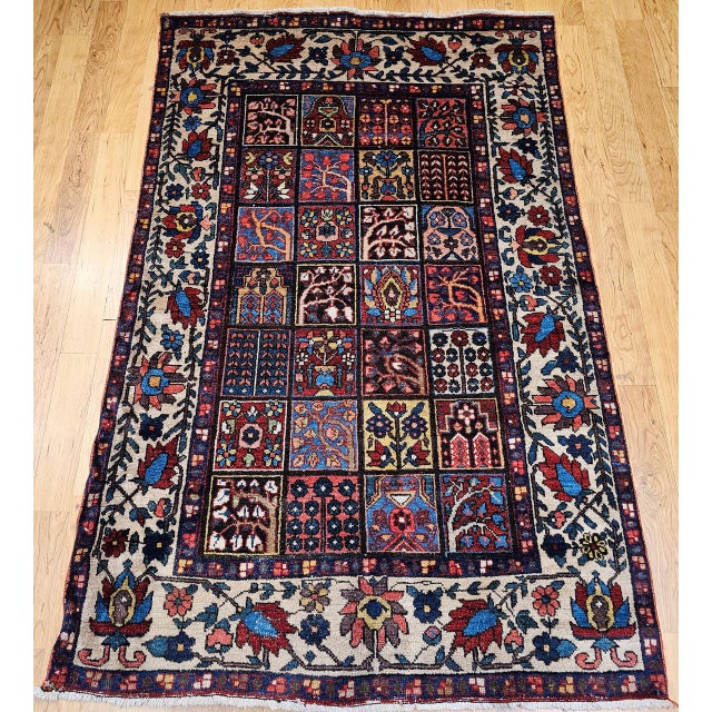 "This exquisite vintage Persian Bakhtiari rug from the second quarter of the 20th century features the highly coveted...