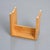 Solid pine stool with an inverted U-shaped base, created for the development of the Les Arcs 1800 ski resort. The design...