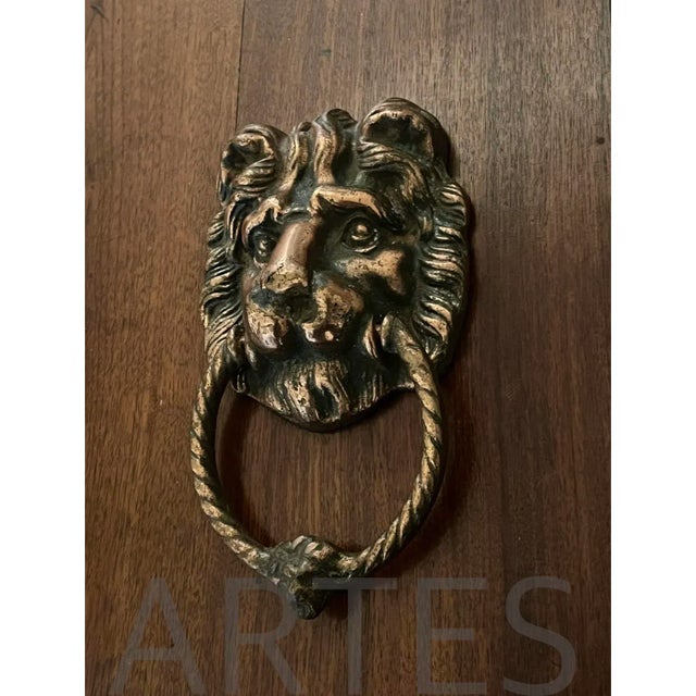 A classic lion's head door knocker on an entrance door always makes for a grand and sophisticated impression. This...