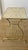 Charming side table/ magazine stand in lacquered brass with a harlequin, diamond-cut patterned top, lyre sides and a...
