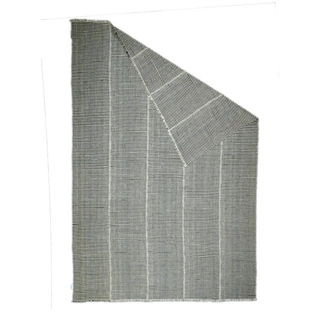 A technique rather than a type of rug. Technique is: slit tapestry, warp shared wefting, single or double weft...