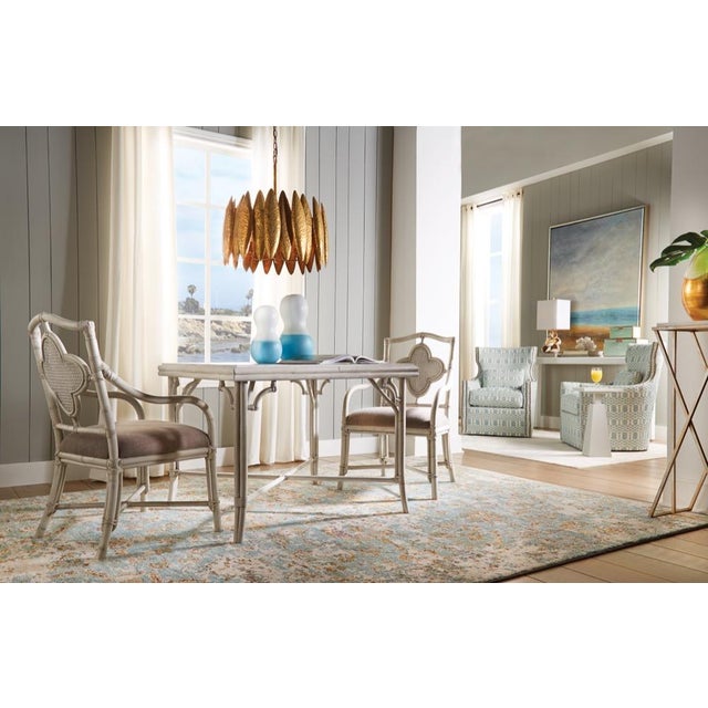 Add shine to your table or bookcase with this white glazed euroceramic vase with metallic gold leaf. This exquisite...