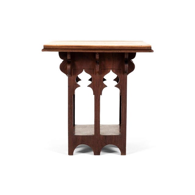 A remarkable 19th century english side table in the moorish taste in both red cedar wood and sycamore. This extraordinary...