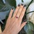 A rich red Madagascar ruby commands this ring, encircled by earth-mined diamonds in solid 14K white gold. The ruby is...