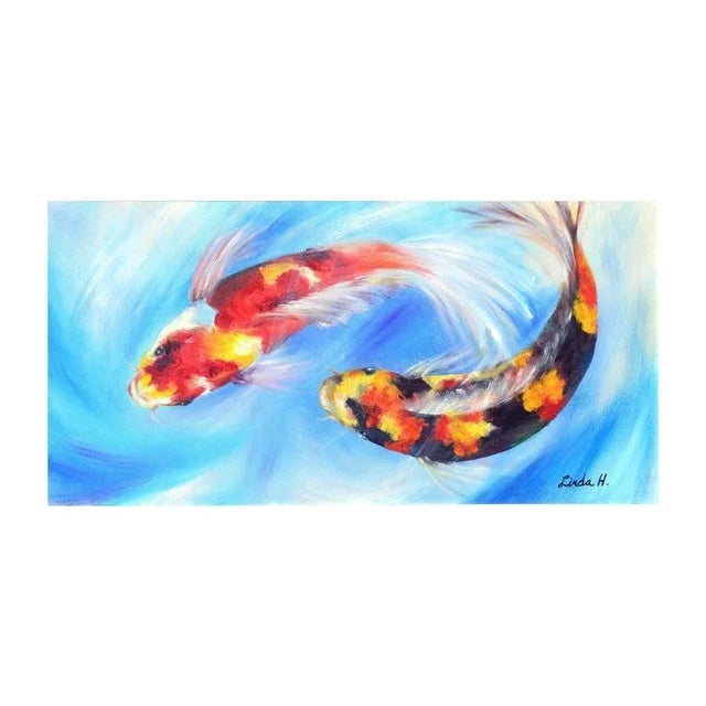 Dramatic and colorful painting of two Koi. Circa 2000. Signed lower right corner "Linda H." Presented in white painted...