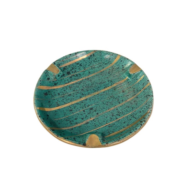 Mid-century sgraffito pottery ashtray with hand-painted gold detail. No maker's mark. Minimal age wear.