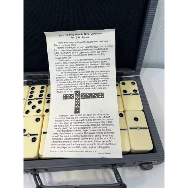 Nice vintage set of boxed dominoes.