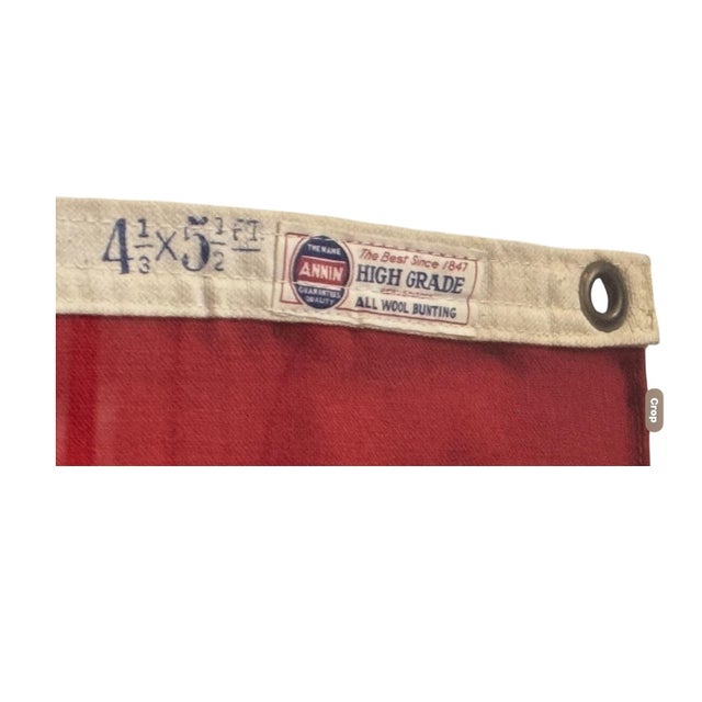 A striking and authentic vintage maritime pennant flag featuring bold red, white, and navy graphics with the inscription...