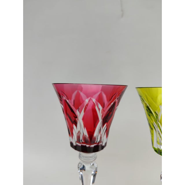 Two large Saint Louis crystal glasses, Camargue pattern. One chartreuse green and one red. They are in very good...