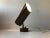 Cylindrical wall lamp composed of brown powder coated aluminium with joint and switch in patinated brass. Anonymous danish...