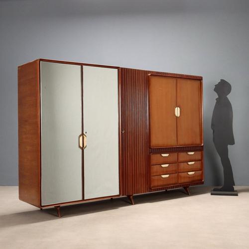 Vintage 20th-century Italian-made wardrobe with hinged doors, drawers, and a mirrored front with a grissinata finish....