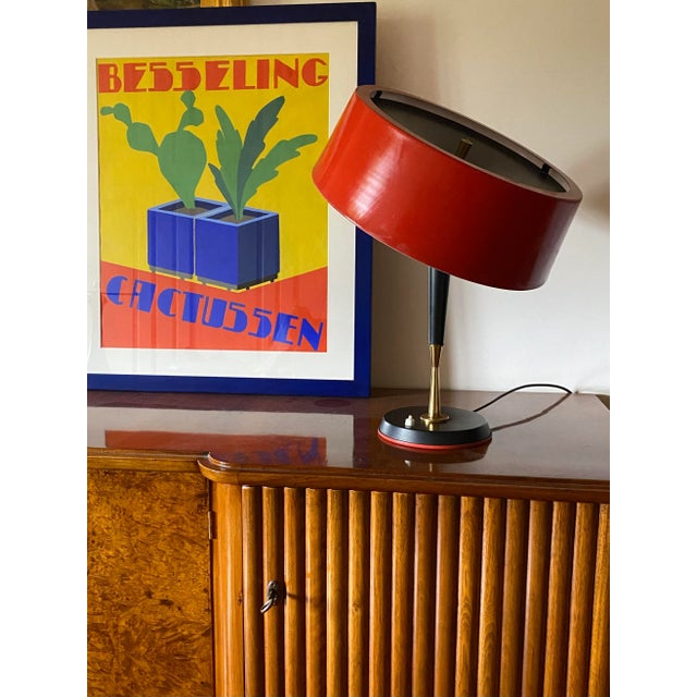 Rare brass and lacquered red aluminium table / desk lamp designed by Oscar Torlasco Produced by Lumi, Italy, 1954 Triple...