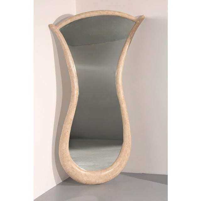 This exceptional Italian design mirror from around 1960 is a true statement piece that embodies the elegance and...