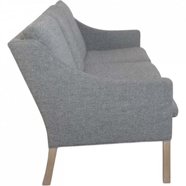 Børge Mogensen 3.seater sofa, model 2209, upholstered in grey Hallingdal fabric and with legs of oak. The sofa is from the...