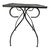 Bring classic mid-century charm to your outdoor or indoor living space with this versatile wrought iron side table....