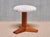 This sculptural three-legged stool was designed and crafted in Denmark during the 1950s. It showcases an architectural,...