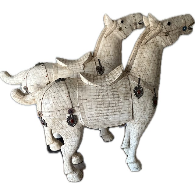 This item is a pair of Chinese Tang Dynasty-style monumental horse statues featuring tessellated bone veneer. They are...