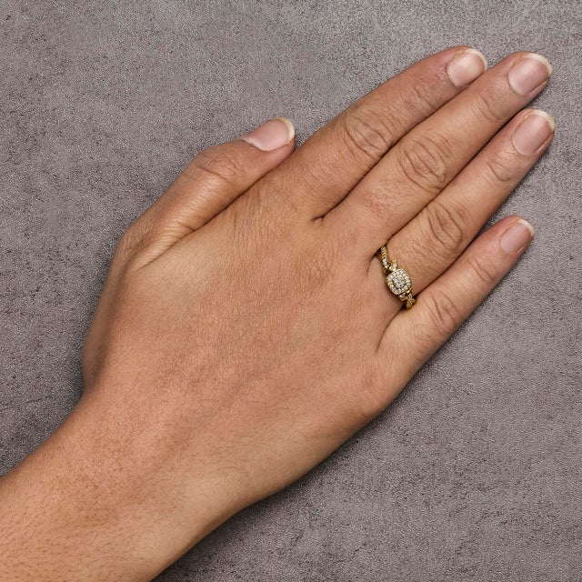 Early 21st Century 10K Yellow Gold Twisted Shank 1/10 Cttw Diamond Composite Halo Engagement Ring (I-J Color, I3 Clarity) - Size 6 For Sale - Image 5 of 6