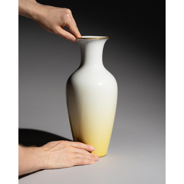 A graceful tall porcelain vase produced by Rosenthal at its Selb-Plößberg factory in Bavaria. Defined by its elegant...