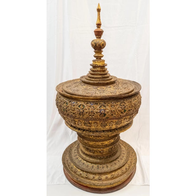 We are offering this massive South East Asian offering bowl in the form of a stupa. The body is lacquered, then decorated...