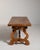 A distinguished example of Spanish ecclesiastical tradition, this early 20th-century refectory table is crafted from rich,...