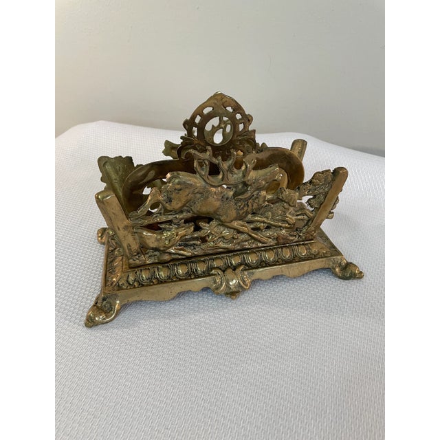 A stately Antique Brass plated cast iron letter holder by the prestigious Bradley and Hubbard Co. Maker's mark embossed on...