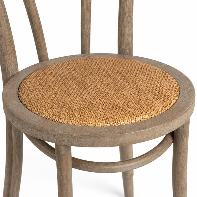 Bistro style oak wood frame dining chair with comfy rattan seat. Curved wood design makes a beautiful chair for any dining...