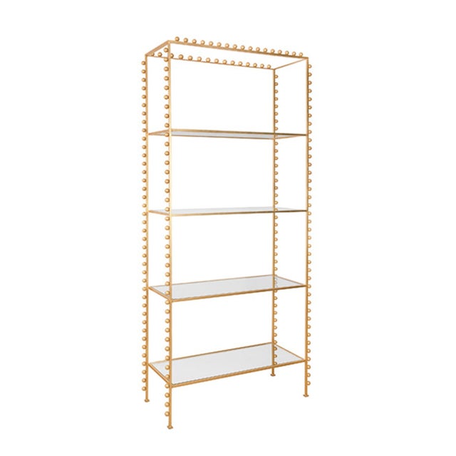 New special order item. Not vintage. The Goldie Etagere is a tall open shelved bookcase with a ball lined design in gold...