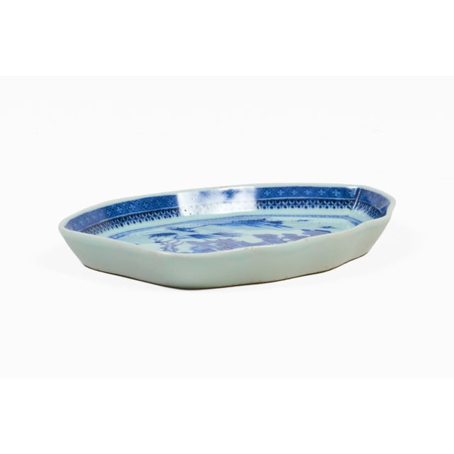 Antique Chinese porcelain hand-painted blue and white leaf-shaped scalloped dish in the traditional Canton Willow pattern...