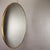 Round mirror with a 70s-80s design. Lightweight shaped brass frame. Mirror without major scratches despite its age....