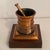 The mortar features a flared rim, a deep cylindrical body with horizontal decorative ridges, mounted on a solid Walnut...