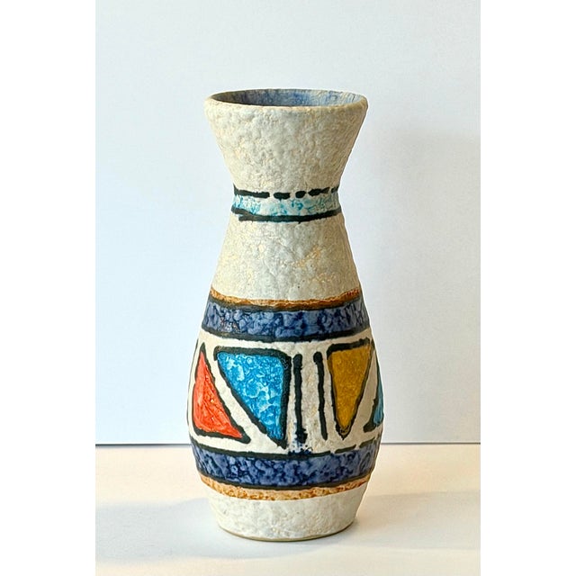 This is a Signed U Keramic West German pottery vase. The mark states: Handgemalt which means hand painted and in bright...