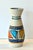 This is a Signed U Keramic West German pottery vase. The mark states: Handgemalt which means hand painted and in bright...
