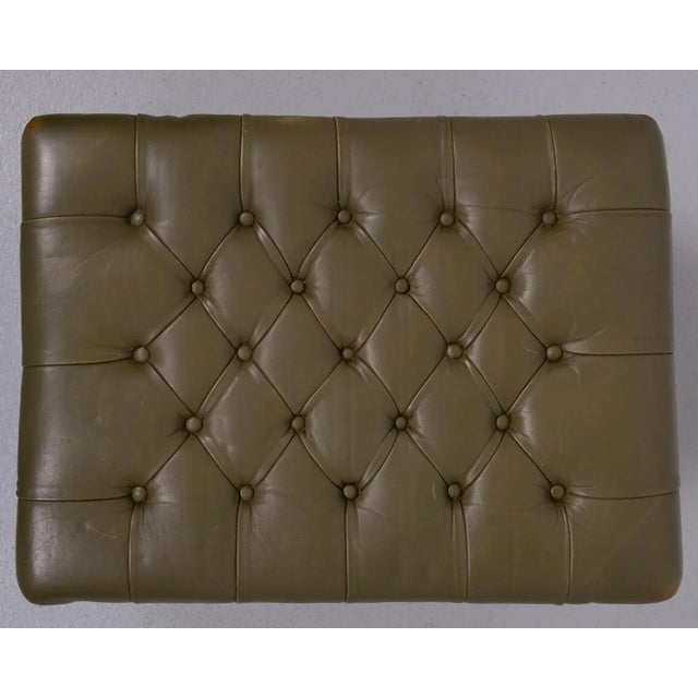 Classic Chesterfield foot stool .Mahogany base, comes with a Capped Green Leather upholstery. Good vintage condition.