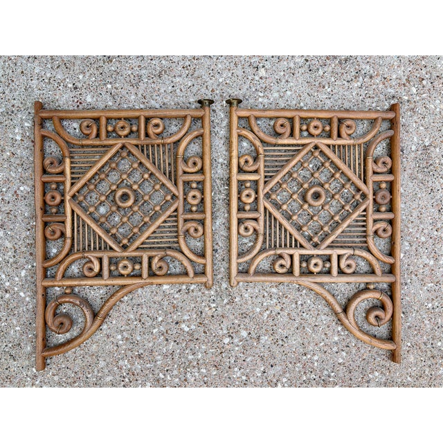 Description: Pair of antique Victorian stick-and-ball fretwork corner fan brackets featuring elaborate hand-carved...
