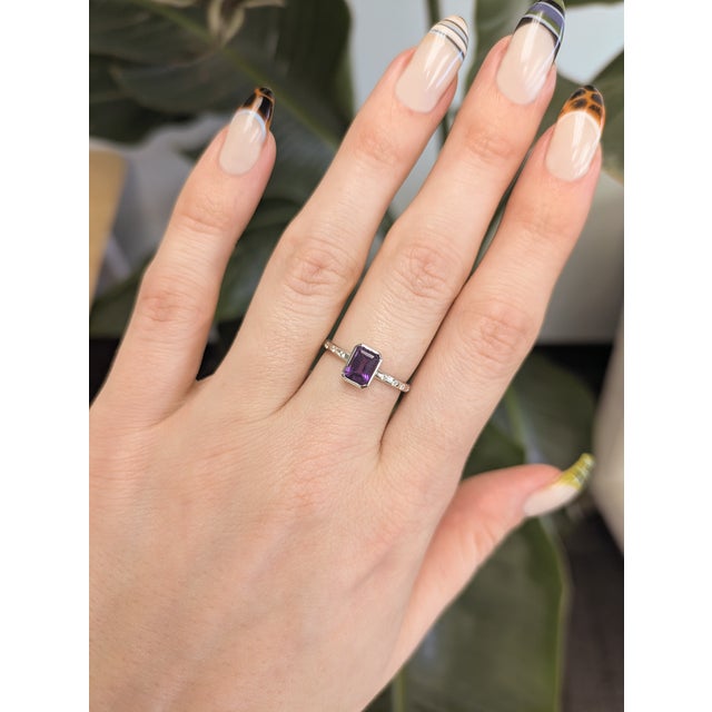 This 1ct Zambian amethyst ring showcases a rich, deep purple gemstone that catches the light from every angle. Accented...