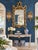 An exceptional circa 1920–1940 Chinoiserie mirror, entirely hand-carved in wood, featuring an elaborate and deeply...